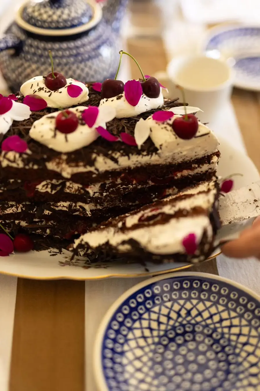 Cake with cherries and petals